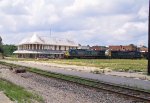 CSX 235 leads a coal train past the unrestored station